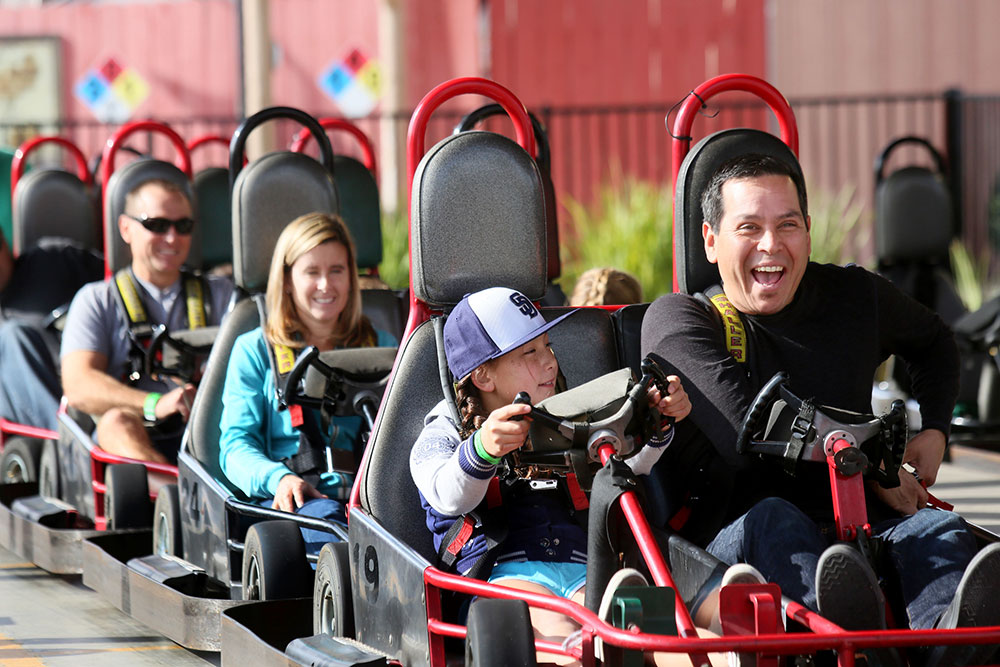 Family enjoying go-karts at Mulligan Family Fun Center Murrieta rides