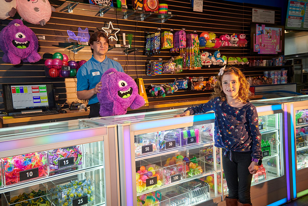Prize redemption counter at Temecula arcade attraction for kids