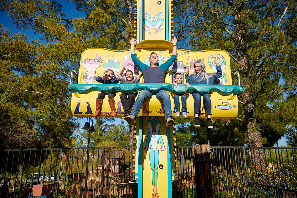 Children on colorful Frog Hopper at Mulligan Murrieta rides