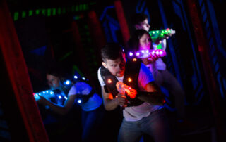 Emotional guy playing laser tag