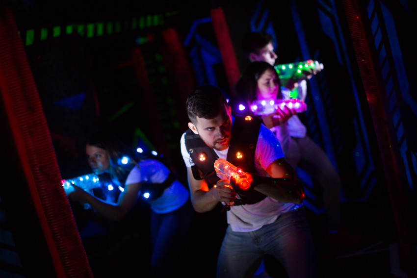 Emotional guy playing laser tag